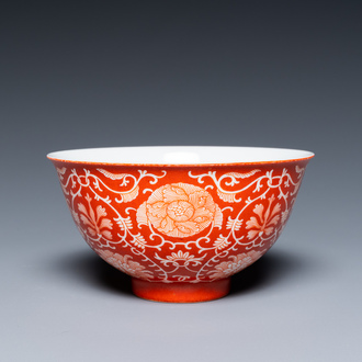 A Chinese coral-ground reserve-decorated 'lotus' bowl, Jiaqing mark, 19/20th C.