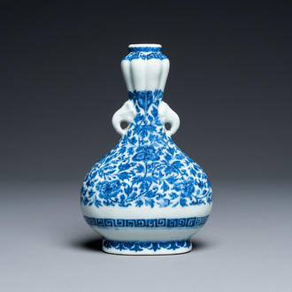 A Chinese blue and white Ming-style vase with floral design, probably Qianlong