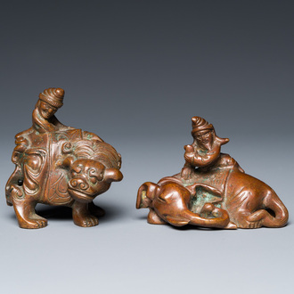 Two Chinese bronze scroll weights with Sogdian riders on a Buddhist lion and an elephant, Qing