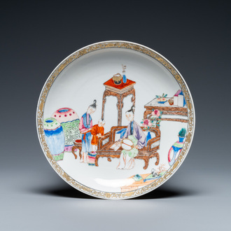 A fine Chinese famille rose eggshell porcelain plate with a boy and two governesses in an interior, Yongzheng