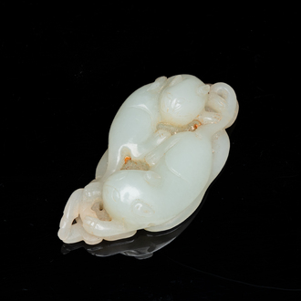 A Chinese 'twin cat' carved jade pendant, Qing