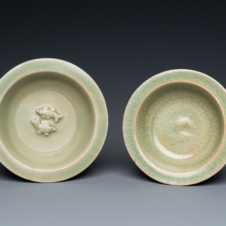 Two Chinese celadon-glazed bowls, one with twin fish, Ming