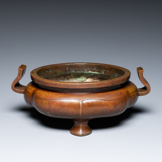 A Chinese lotus-shaped bronze tripod censer, late Ming or early Qing