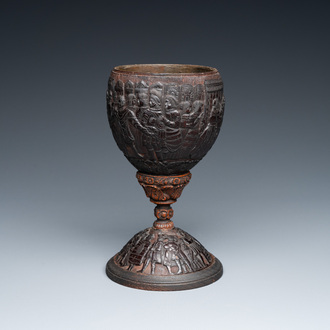 A Spanish colonial carved corozo and coconut marriage cup, probably Cuzco, Peru, 17th C.