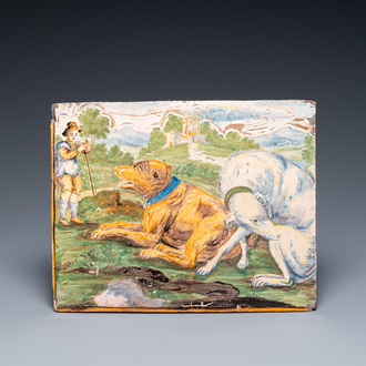 Een polychrome plaquette met een herder met twee grote honden, Castelli, Italië, 18e eeuw