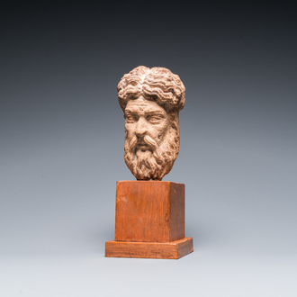 A carved stone head of a bearded man, 15/16th C.