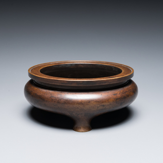 A Chinese bronze tripod censer, Xuande mark, Kangxi/Qianlong