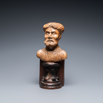 An Italian alabaster bust of a bearded man on a later wooden stand, 16th C.