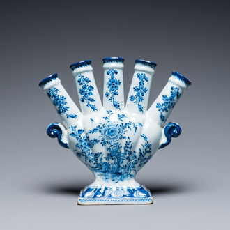 A Dutch Delft blue and white tulip vase with floral design, 18th C.