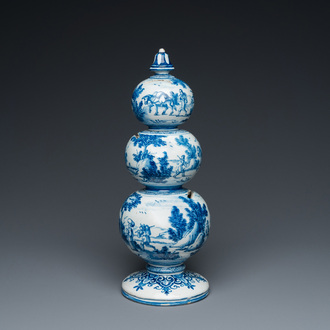 An exceptional Dutch Delft blue and white triple gourd money bank, early 18th C.