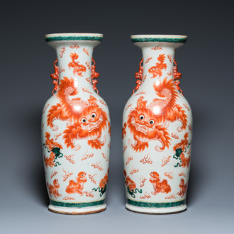 A pair of Chinese polychrome 'Buddhist lions' vases, 19th C.