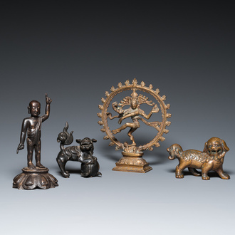 Two Chinese bronze Buddhist lions and a standing infant Buddha, Ming and later