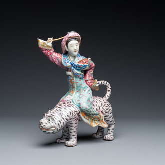 A Chinese famille rose group with a tiger and his rider, 19/20th C.