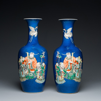 A pair of Chinese famille verte powder blue-ground vases, 19th C.