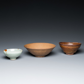 A Chinese Jian bowl, a qingbai bowl with kintsugi repair and a 'lotus' bowl, Song or later