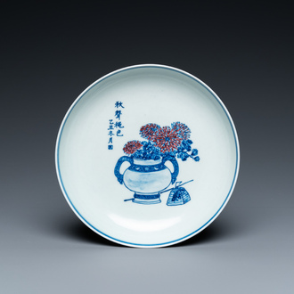 A Chinese blue, white and underglaze red dish, Qianlong mark, 19/20th C.