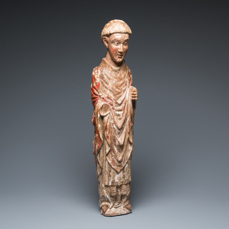 A large polychromed wood sculpture of a saint, Spain or Italy, 14th C.