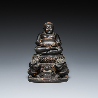 A Thai bronze Buddha with traces of gilding, 19th C.