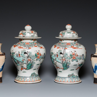 A pair of Chinese famille verte vases with covers and a pair of Nanking vases, 19th C.