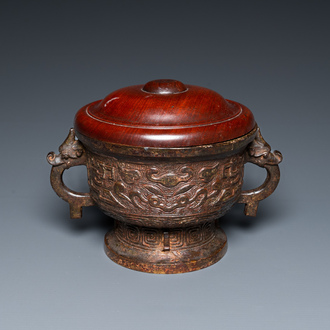 A Chinese archaic bronze censer with later wooden cover, Ming