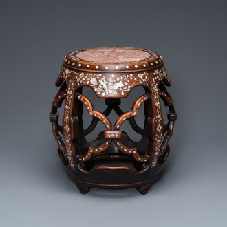 A Chinese mother-of-pearl-inlaid huali wooden drum-form stand or seat, Qing