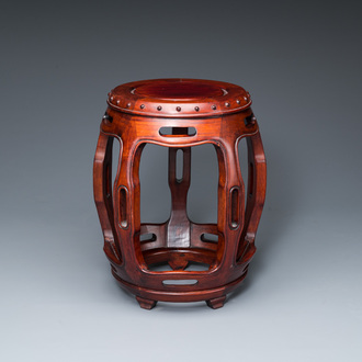 A Chinese wooden drum-form stand or seat, 19/20th C.