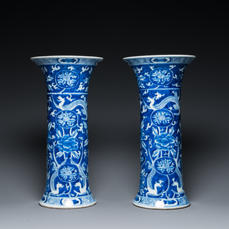 A pair of Chinese blue and white vases with dragons, 19th C.