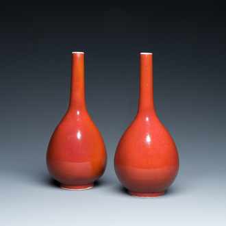 A pair of Chinese monochrome copper-red bottle vases, 19th C.