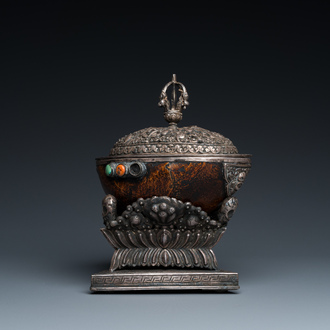 A Tibetan ritual silver-, coral- and turquoise-mounted 'kapala' or skull-bowl, 19th C.