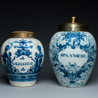 Two Dutch Delft blue and white tobacco jars with brass lids, 18th C.