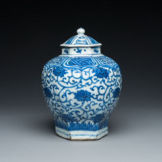 A Chinese hexagonal blue and white 'lotus scroll' vase and cover, Wanli