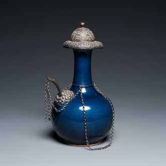 A Chinese monochrome blue-glazed kendi with silvered copper mounts, Qianlong