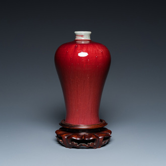 A Chinese peachbloom-glazed 'meiping' vase on wooden stand, 19th C.