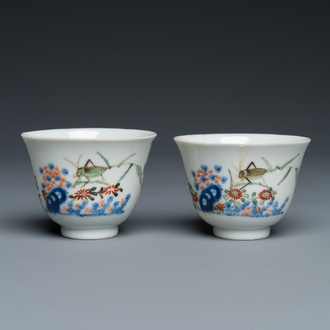 A pair of Chinese famille verte 'grasshopper' teacups, Kangxi mark but probably laer