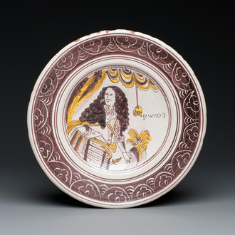 A polychrome Dutch maiolica dish with King William III, late 17th C.