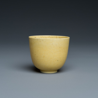 A Chinese monochrome yellow-glazed cup, Kangxi mark and of the period