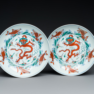 A pair of Chinese doucai 'dragon' plates, Chenghua mark, Kangxi