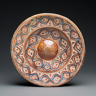 A large Hispano-Moresque lustre-glazed dish with ornamental design, Spain, 16th C.