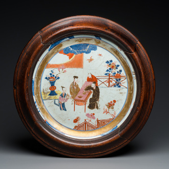 A large Chinese rose-Imari 'tea drinkers' dish, Yongzheng