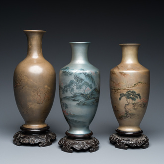 Three Chinese Fuzhou or Foochow lacquer 'landscape' vases on stands, 2nd half 20th C.