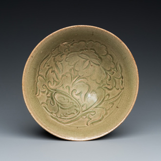 A Chinese Yaozhou celadon bowl with underglaze floral design, probably Ming