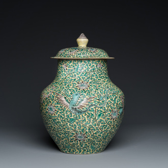 A Chinese yellow-ground verte biscuit 'dragons' vase and cover, 19th C.