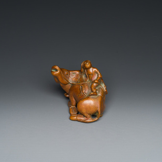 A Chinese bronze 'boy on buffalo' water dropper, Qing