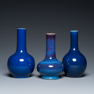 Three Chinese monochrome blue- and flambé-glazed bottle vases, 19/20th C