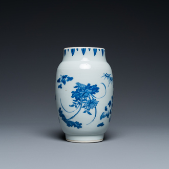 A Chinese blue and white vase with floral design, Transitional period