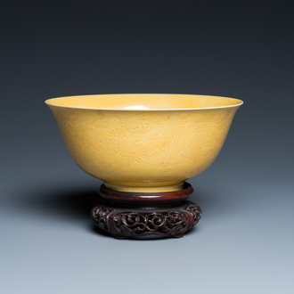 A Chinese monochrome yellow-glazed bowl with anhua dragon design, Qianlong mark but probably later