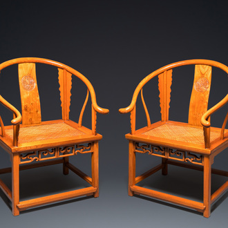 A pair of Chinese elmwood 'horseshoe' chairs, Republic