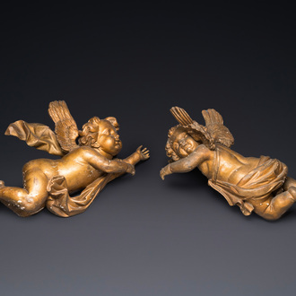 A pair of gilded wooden winged cherubs, probably Flanders, 1st half 18th C.