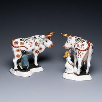 A pair of cold-painted white Dutch Delftware milking groups, 18th C.