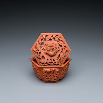 A Chinese Yixing stoneware reticulated hexagonal bowl and cover, Kangxi